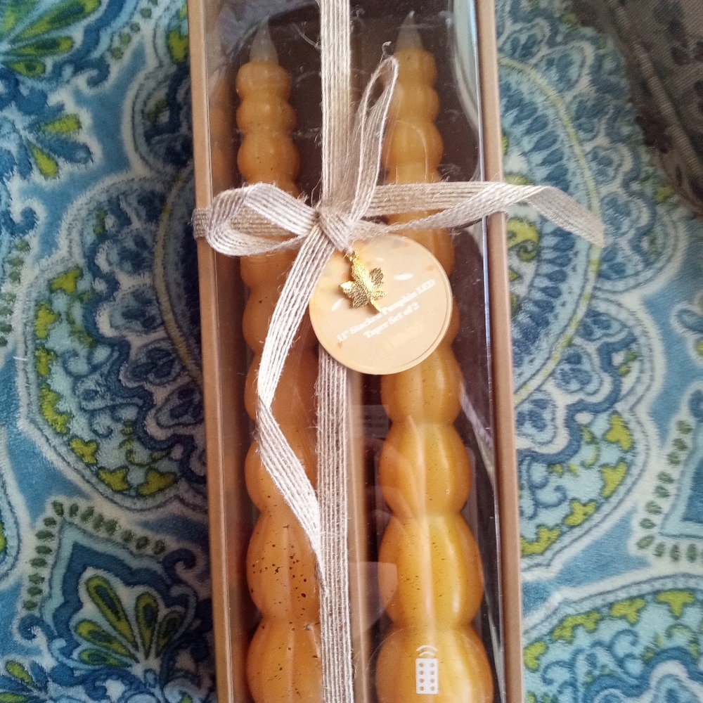 11' inch pumpkin wax tapper set of 2 in box.